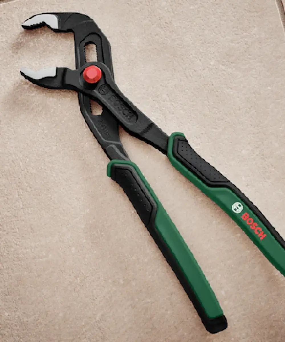 Bosch kliješta papagajke 250 mm s crvenim okidačem i zelenim ručkama na bežičnoj površini.